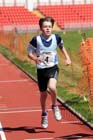 Joshua Cowperthwaite (Middlesbrough Mandale) wins the under-13s 1500 metres.